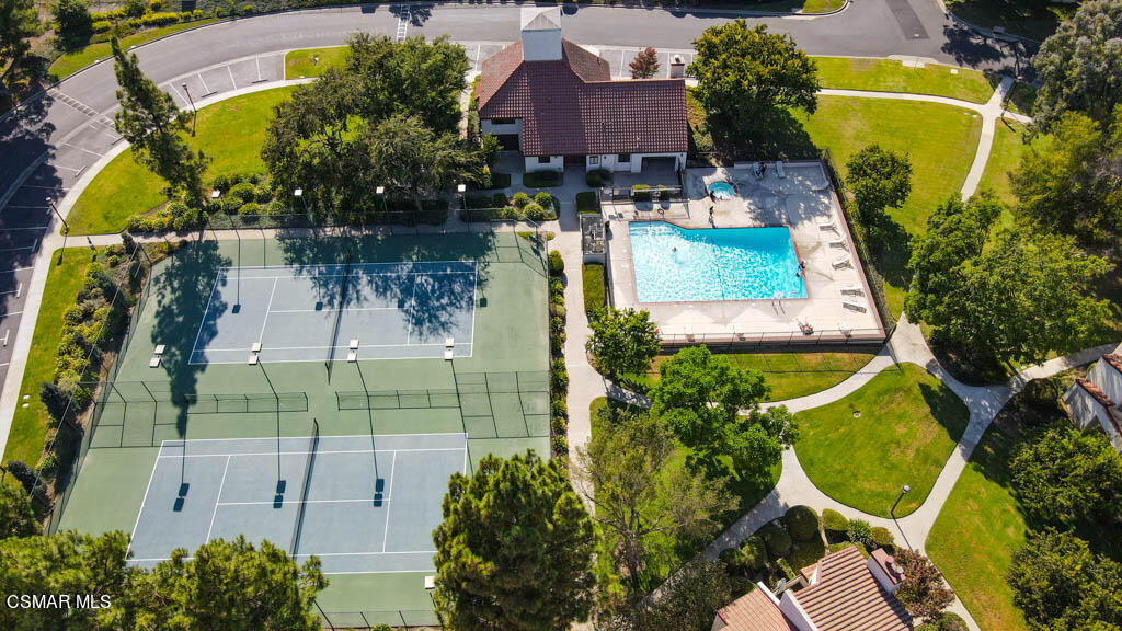 1736 Sinaloa Road, Unit 324 Simi Valley, CA 93065 - Photo 34 of 37 an aerial view of a house with swimming pool and large trees