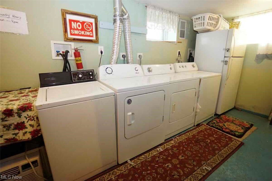 3756 Bosworth Road Cleveland, OH 44111 - Photo 21 of 23 Laundry area featuring washer hookup, separate washer and dryer, and hookup for an electric dryer