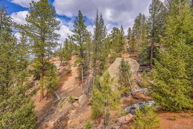 a picture of a wall with a white table