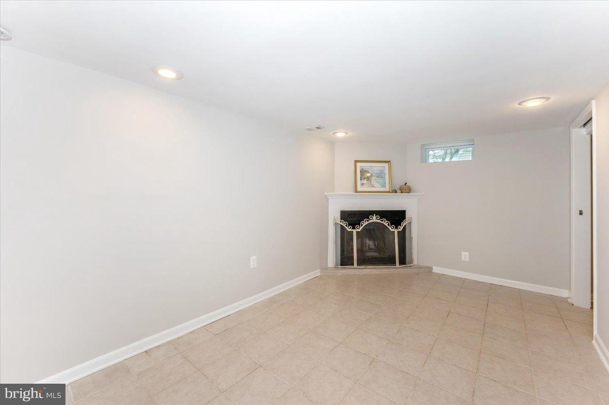 12108 Dewey Road Silver Spring, MD 20906 - Photo 35 of 68 Lower Level Living Room with Working FP!
