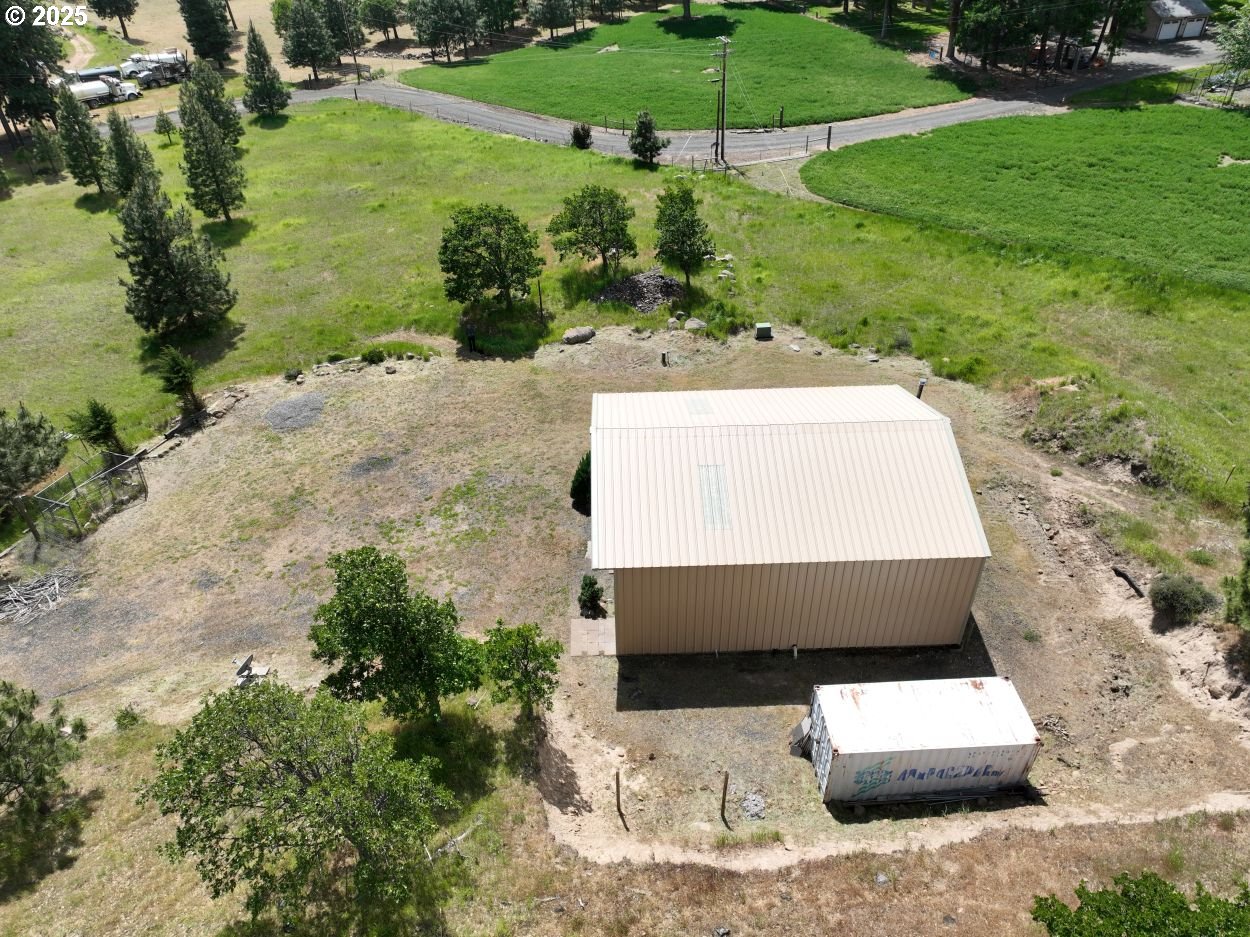 4397 Browns Creek Road The Dalles, OR 97058 - Photo 23 of 37 a view of a yard with table and chairs