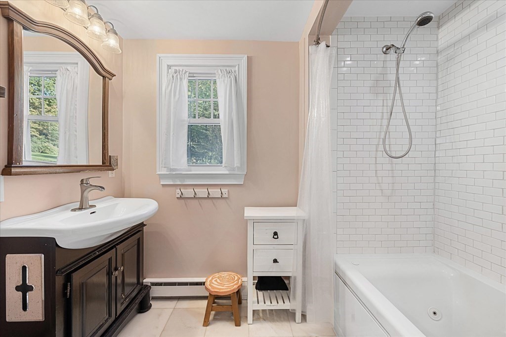 117 May Brook Road Holland, MA 01521 - Photo 14 of 30 a bathroom with a sink toilet a mirror and shower