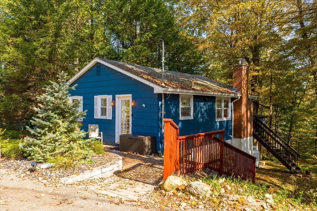 117 May Brook Road Holland, MA 01521 - Photo 2 of 30 a front view of a house with a yard