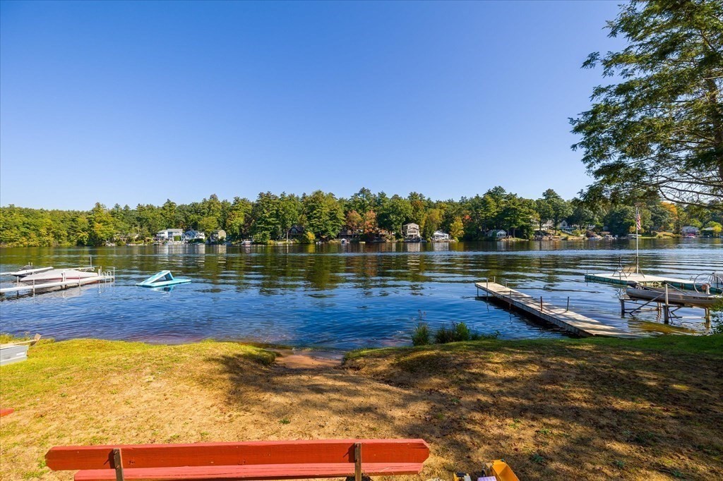 117 May Brook Road Holland, MA 01521 - Photo 23 of 30 a view of a swimming pool with an outdoor seating and a garden