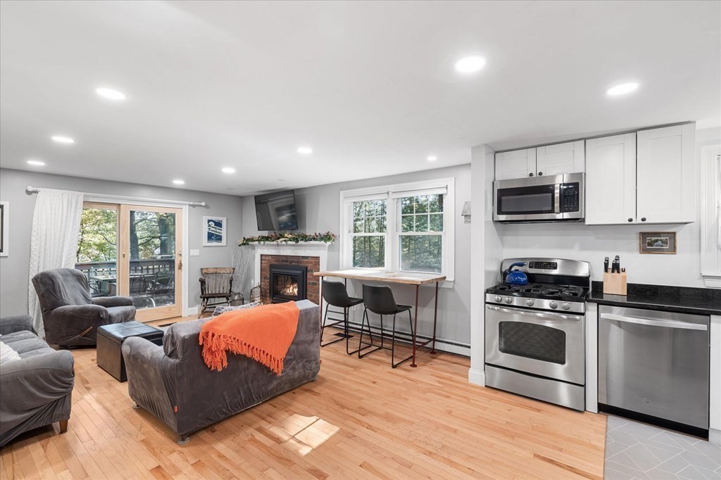 117 May Brook Road Holland, MA 01521 - Photo 7 of 30 a living room with furniture and a wooden floor