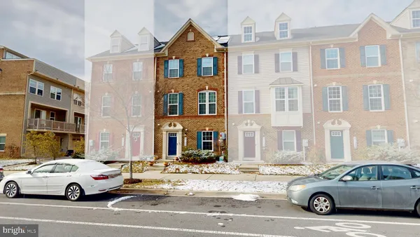 a car parked in front of a house
