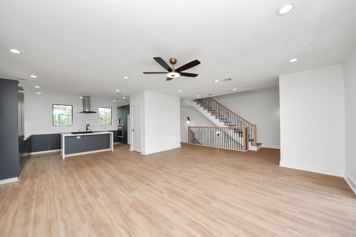 9022 Ferdinand Street Houston, TX 77051 - Photo 11 of 25 Where the living room flows into the kitchen-- so nobody misses a moment (or a snack)!