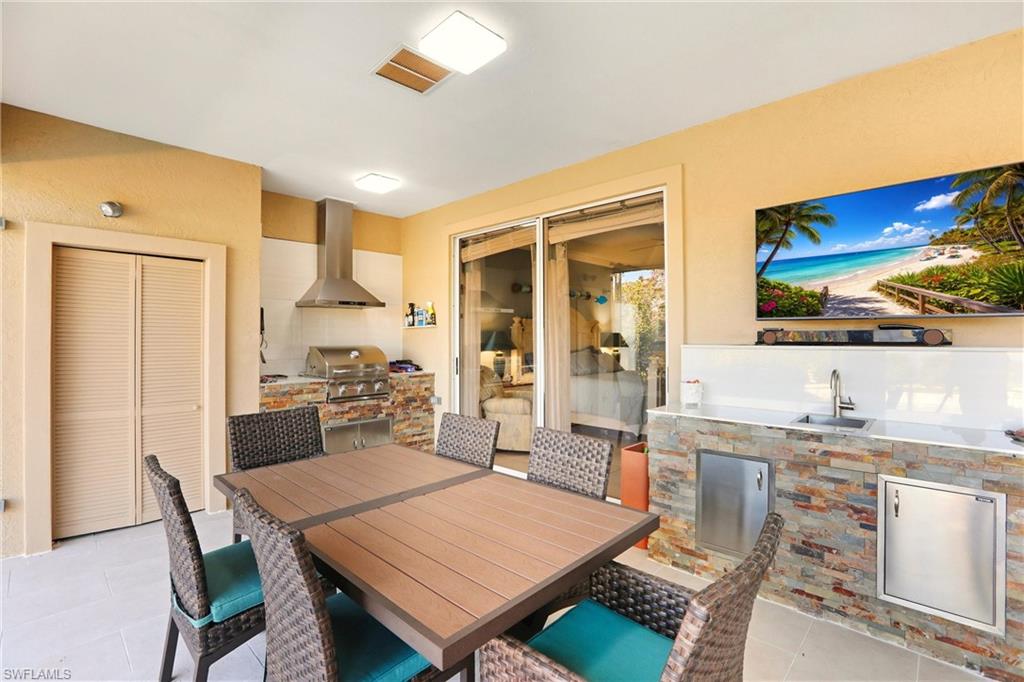 11180 Phoenix Way Naples, FL 34119 - Photo 26 of 43 Dining room featuring light tile patterned flooring