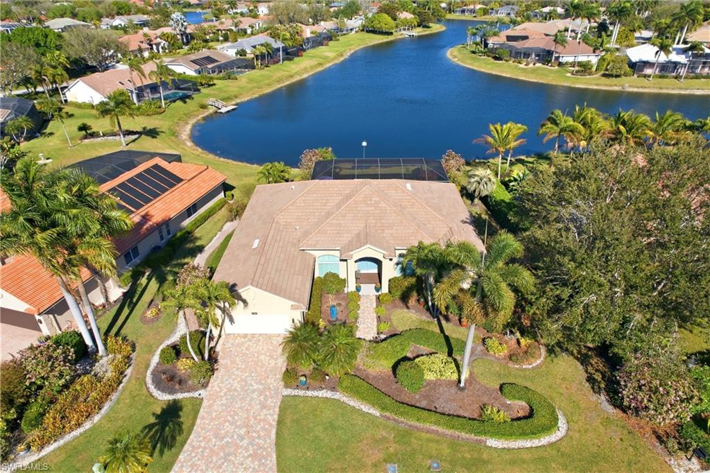11180 Phoenix Way Naples, FL 34119 - Photo 3 of 43 Aerial view of residential area with a nearby body of water