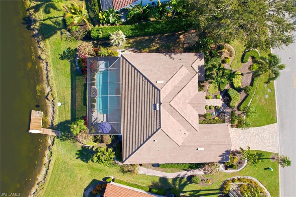 11180 Phoenix Way Naples, FL 34119 - Photo 36 of 43 Aerial view of property and surrounding area with a large body of water