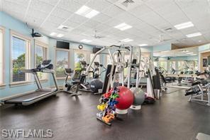 11180 Phoenix Way Naples, FL 34119 - Photo 41 of 43 Exercise room with a paneled ceiling