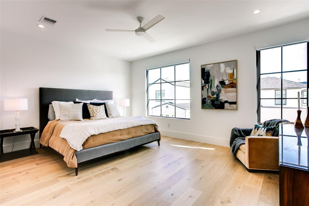 9721 Kerrisdale Lane Dallas, TX 75230 - Photo 12 of 25 a spacious bedroom with a bed and a window