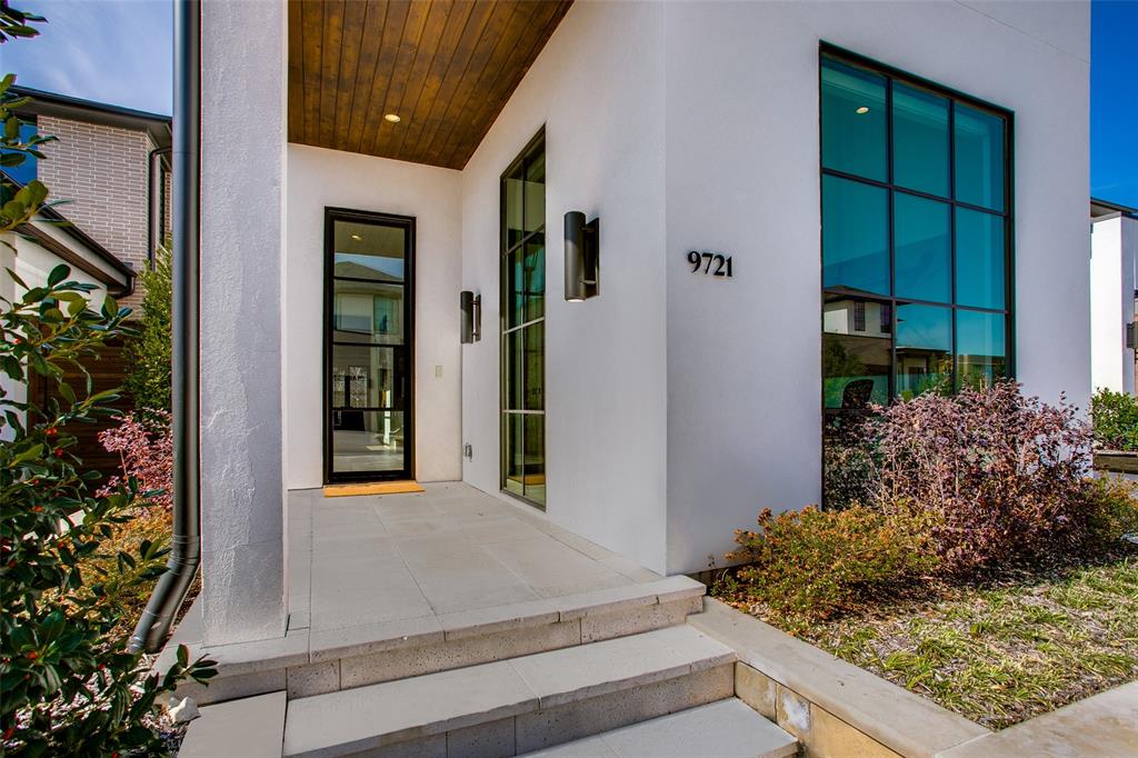 9721 Kerrisdale Lane Dallas, TX 75230 - Photo 23 of 25 a view of entrance of house and yard