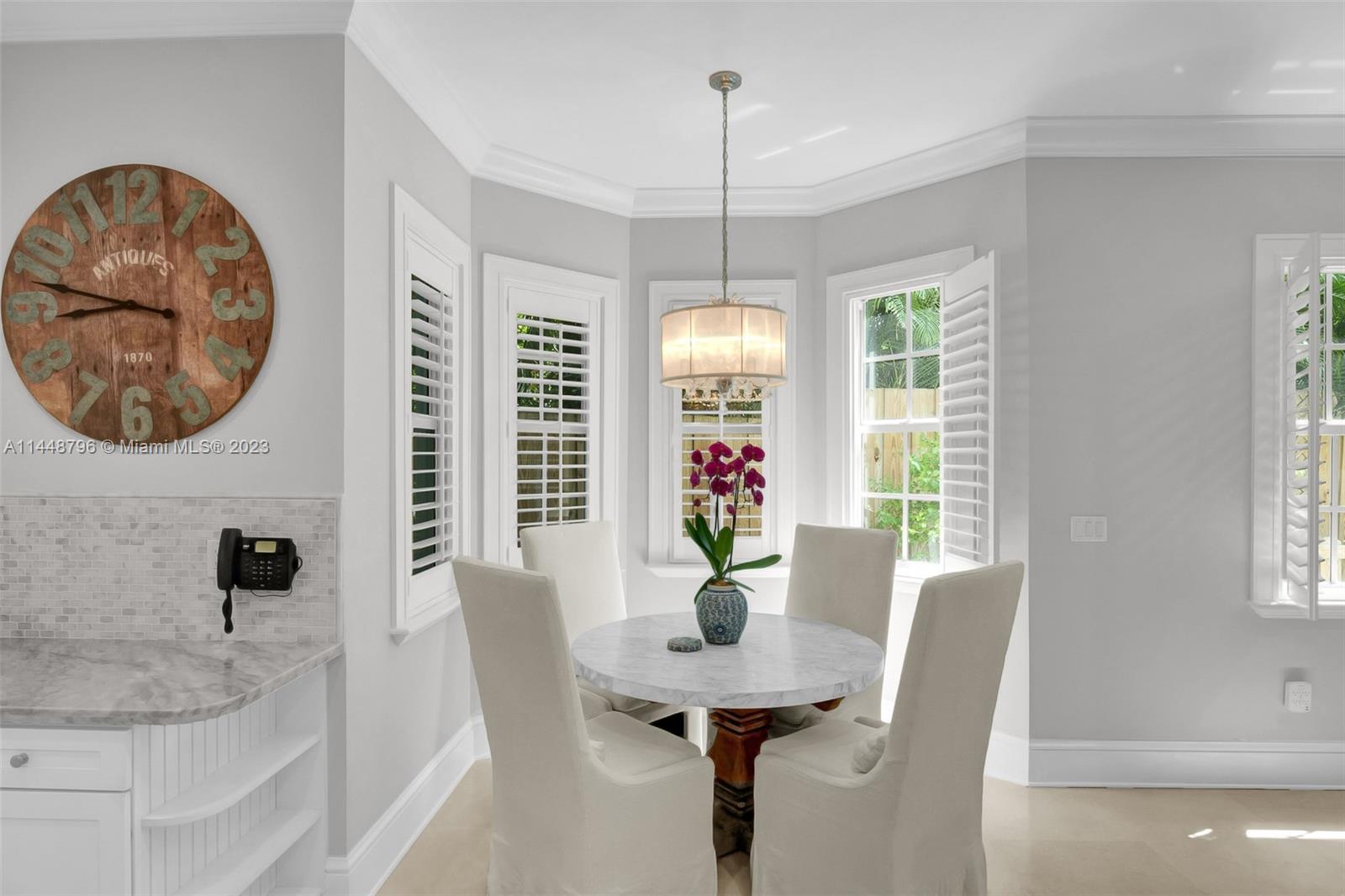 4270 Lennox Drive Miami, FL 33133 - Photo 14 of 39 a view of a dining room with furniture and window