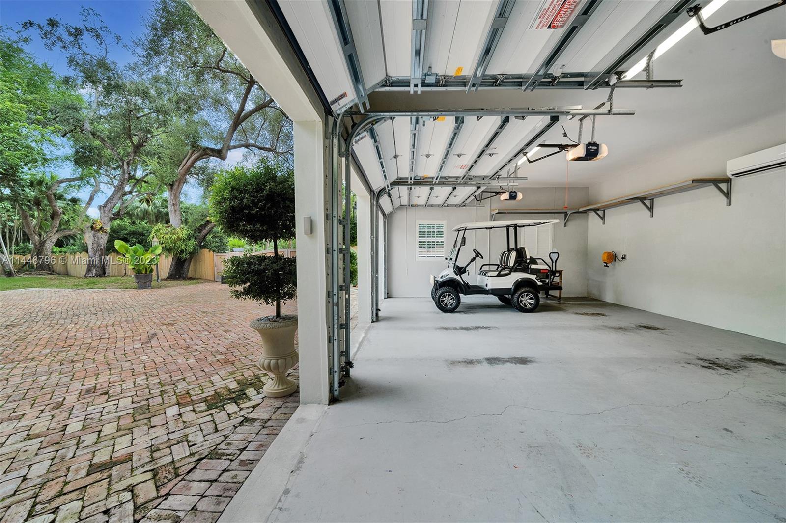 4270 Lennox Drive Miami, FL 33133 - Photo 35 of 39 a view of parking garage with cars