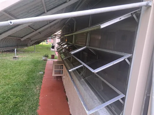 a view of backyard with green space