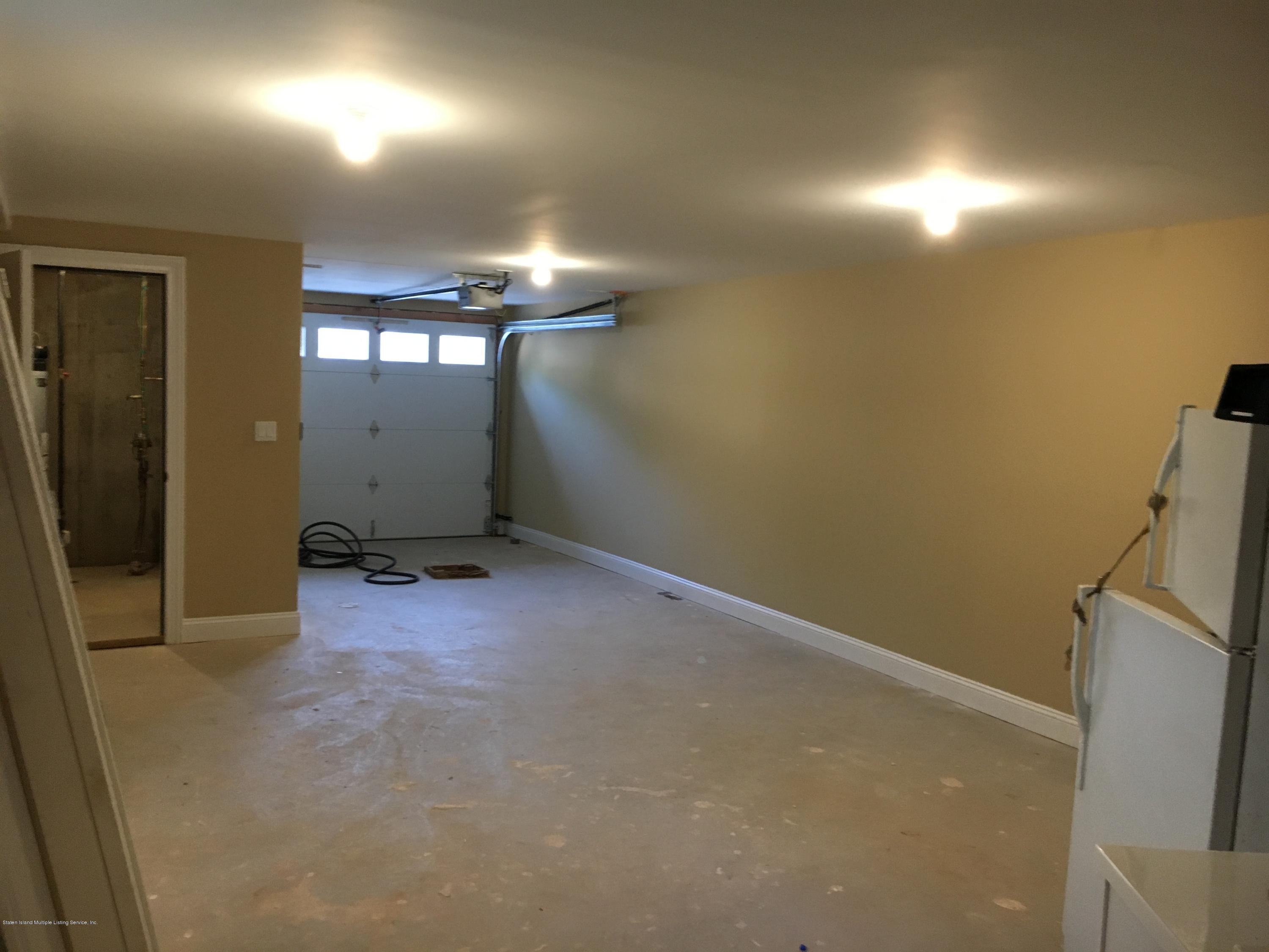 665 Annadale Road Staten Island, NY 10312 - Photo 19 of 20 Sample Two car Garage
