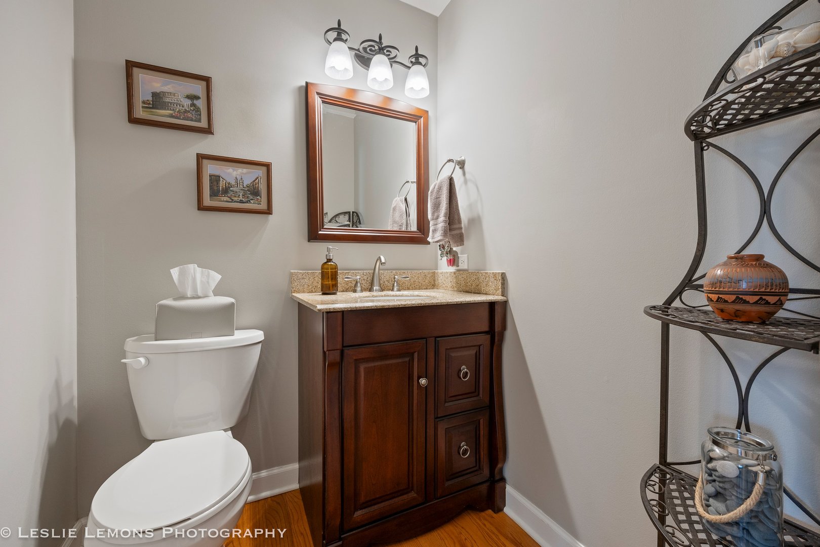 3432 Drover Lane Darien, IL 60561 - Photo 16 of 29 a bathroom with a toilet a sink and mirror