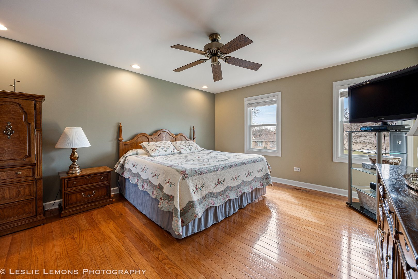 3432 Drover Lane Darien, IL 60561 - Photo 17 of 29 a bedroom with a bed and a flat screen tv