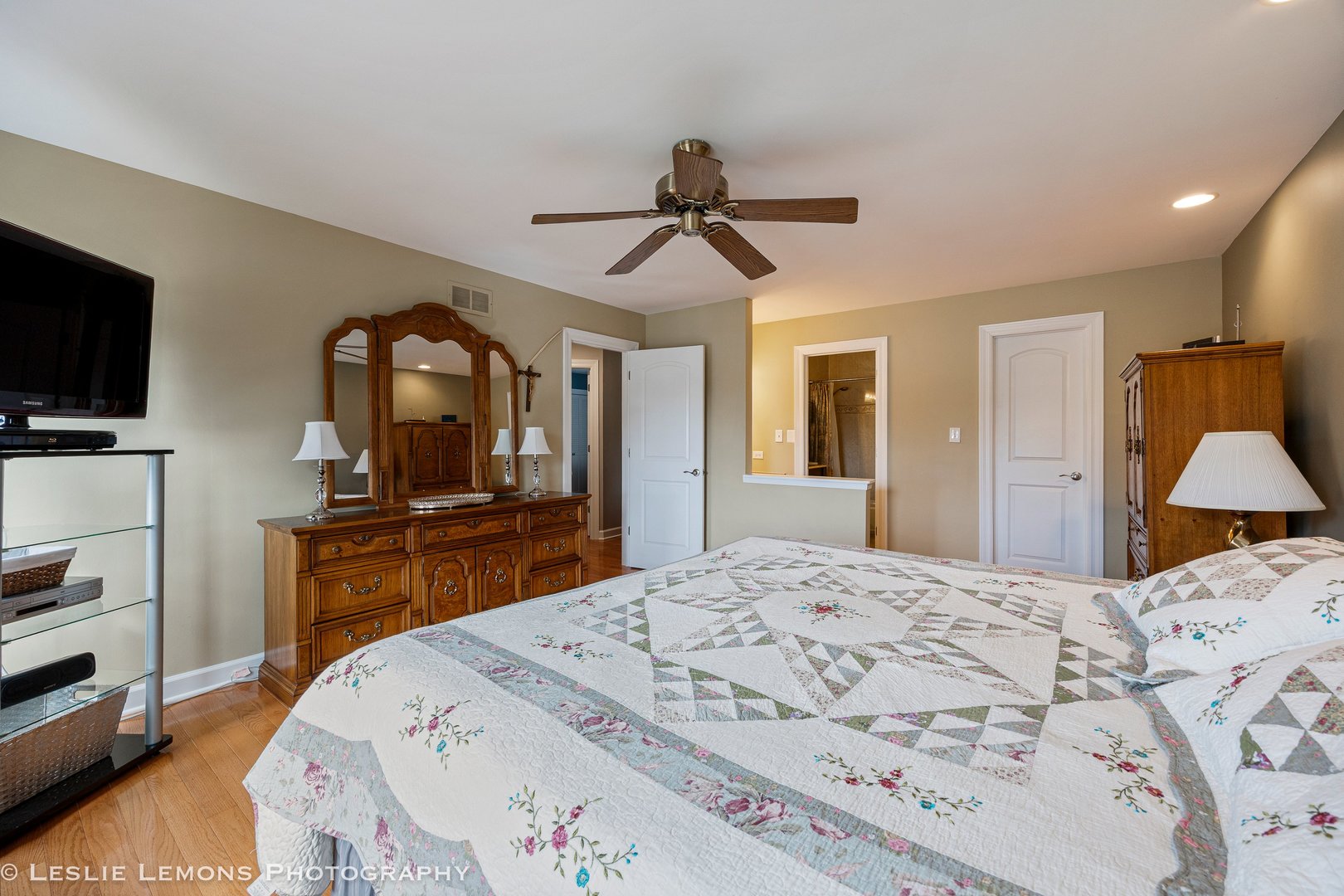 3432 Drover Lane Darien, IL 60561 - Photo 18 of 29 a bedroom with a bed and a flat screen tv