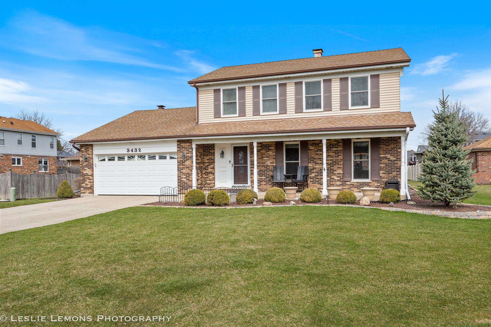 3432 Drover Lane Darien, IL 60561 - Photo 26 of 29 a front view of a house with a yard and porch