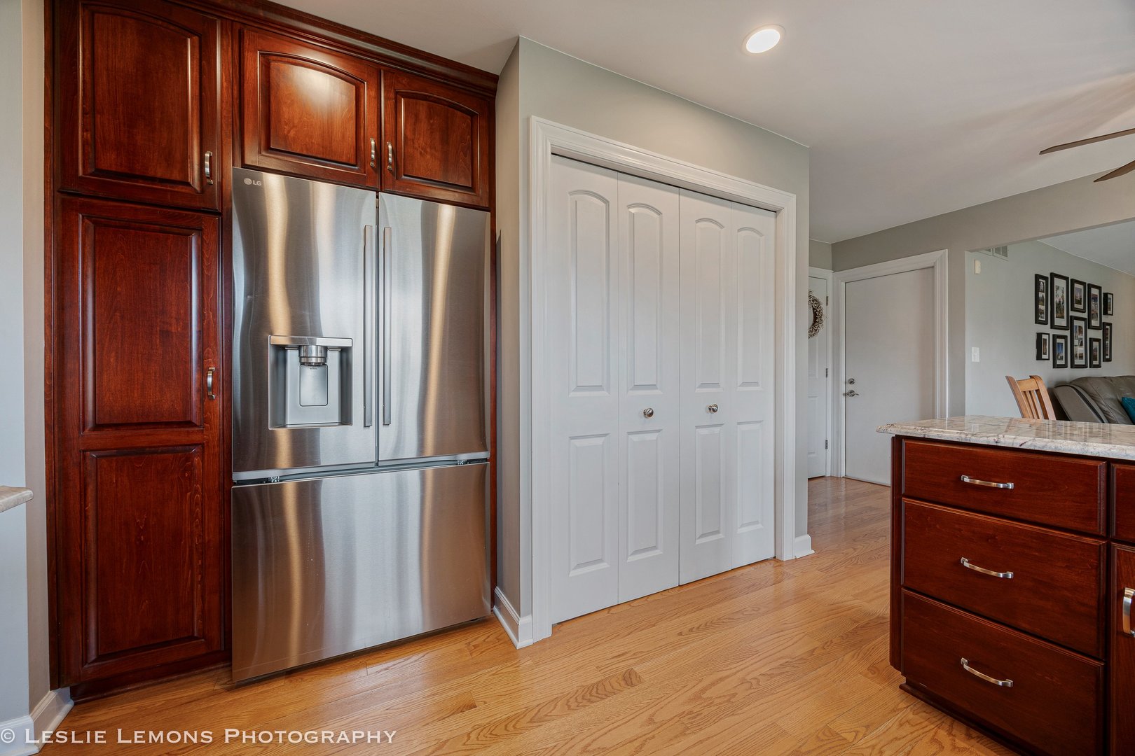 3432 Drover Lane Darien, IL 60561 - Photo 4 of 29 a view of a refrigerator in kitchen and wooden floor