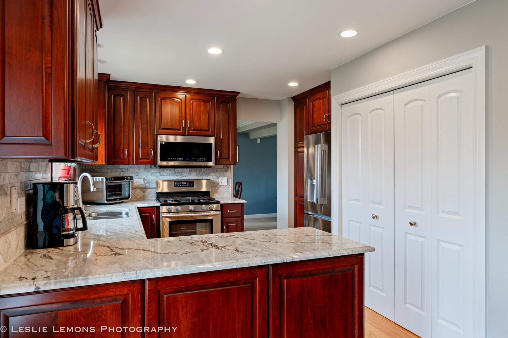 3432 Drover Lane Darien, IL 60561 - Photo 5 of 29 a kitchen with stainless steel appliances granite countertop a stove refrigerator and sink
