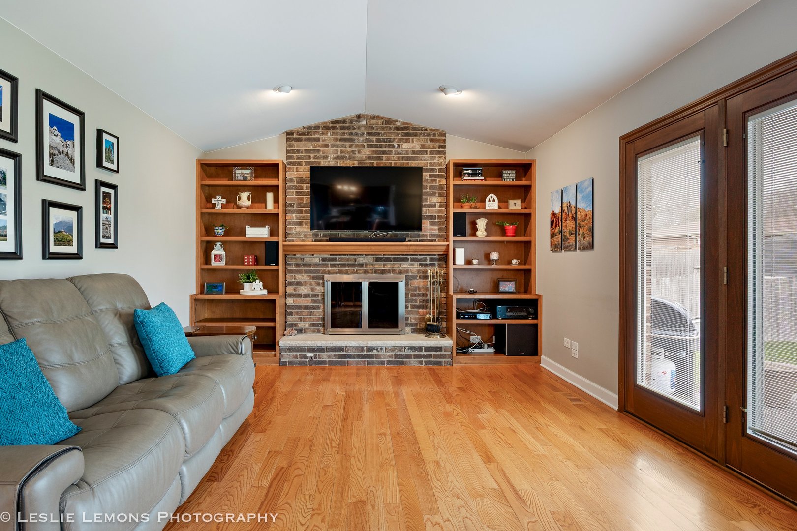 3432 Drover Lane Darien, IL 60561 - Photo 8 of 29 a living room with fireplace furniture and a flat screen tv
