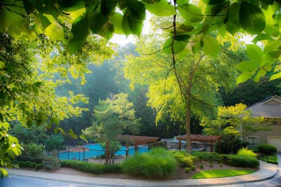 3450 K Jones Mill Road, Unit 218 Norcross, GA 30092 - Photo 20 of 29 a view of a house with a yard