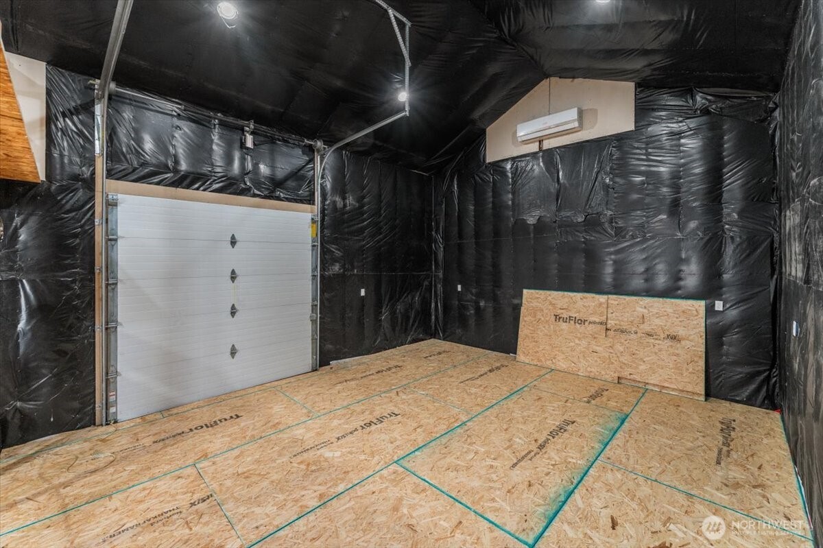 420 Plata Road Brewster, WA 98812 - Photo 26 of 36 a bed room with a bed and a night stand