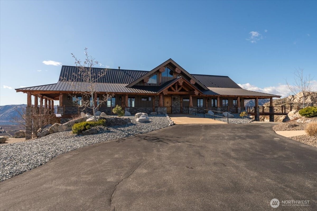 420 Plata Road Brewster, WA 98812 - Photo 31 of 36 a view of a house with sitting area and furniture