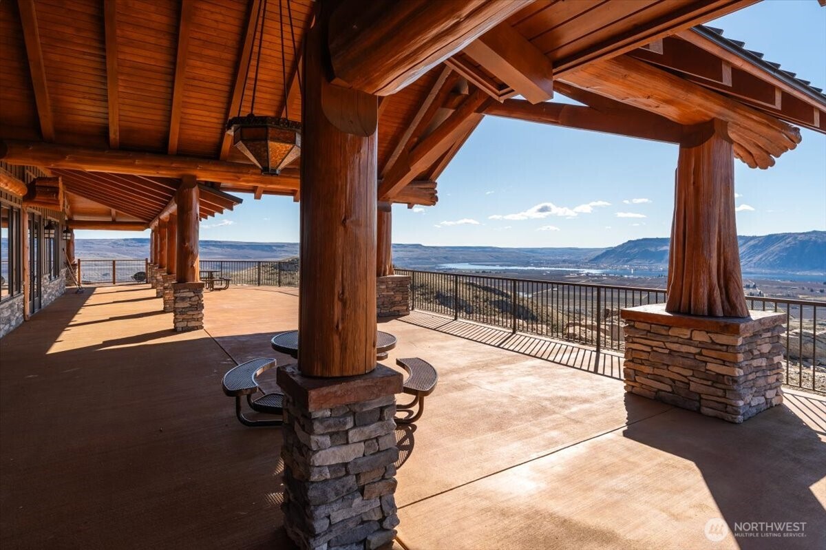 420 Plata Road Brewster, WA 98812 - Photo 36 of 36 a view of a porch with furniture and a yard