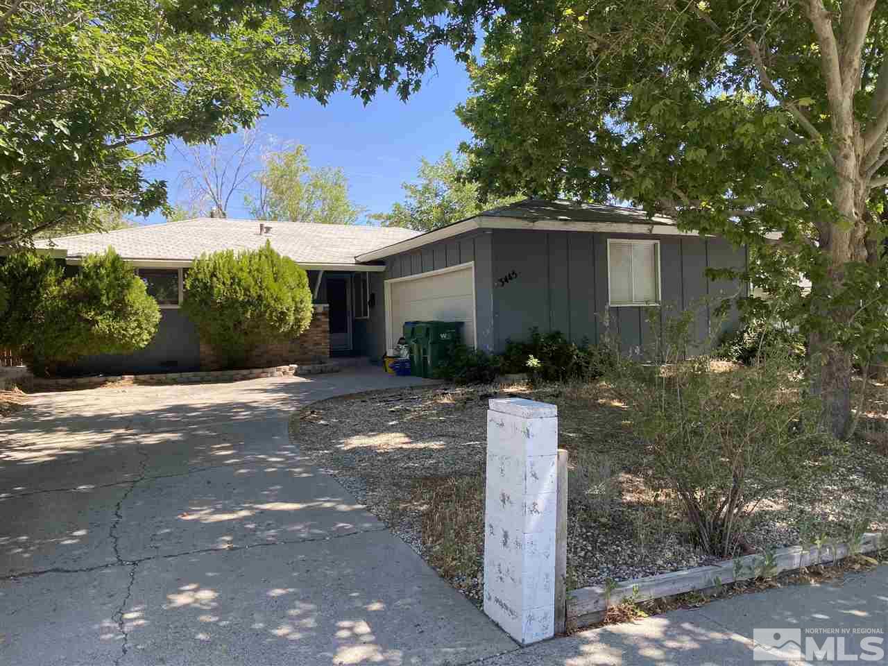 3445 Rauscher Drive Reno, NV 89503 - Photo 1 of 12 a front view of a house with garden