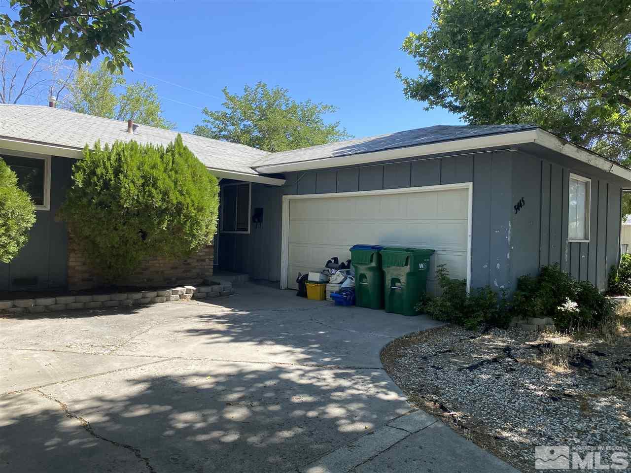 3445 Rauscher Drive Reno, NV 89503 - Photo 2 of 12 a view of a house with a yard