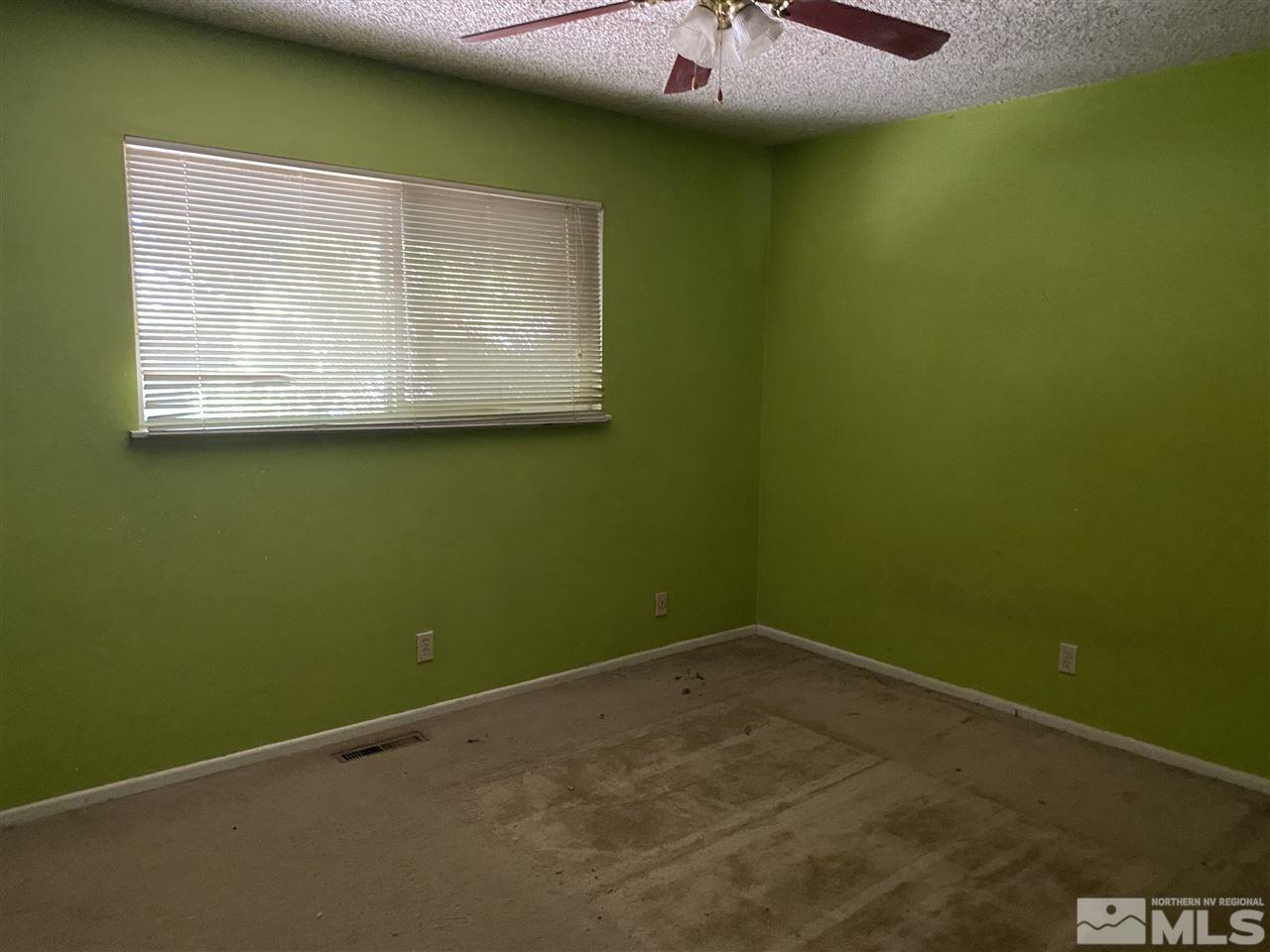 3445 Rauscher Drive Reno, NV 89503 - Photo 6 of 12 a view of a room that has a fan and window