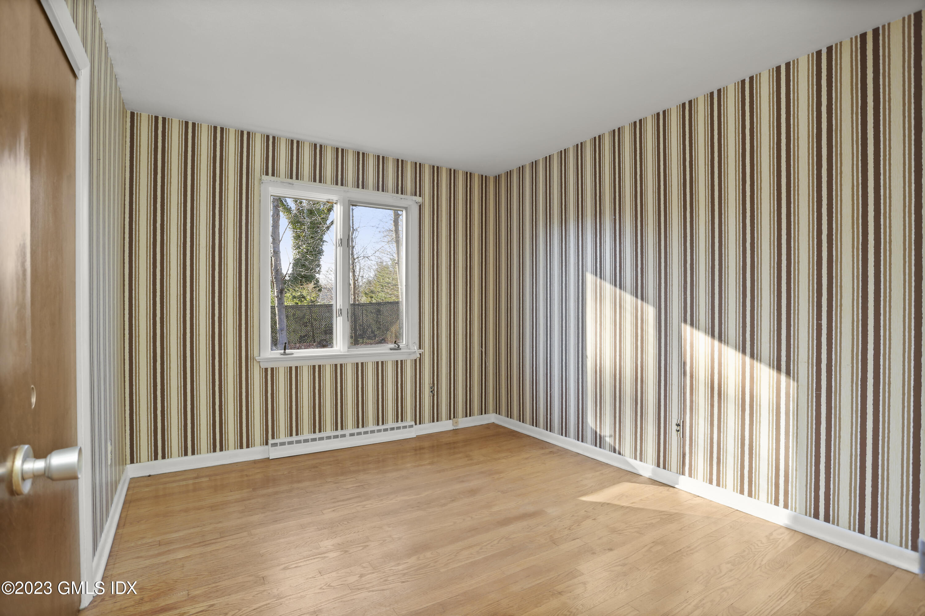 28 Intervale Road Stamford, CT 06905 - Photo 15 of 20 a view of an empty room with a window