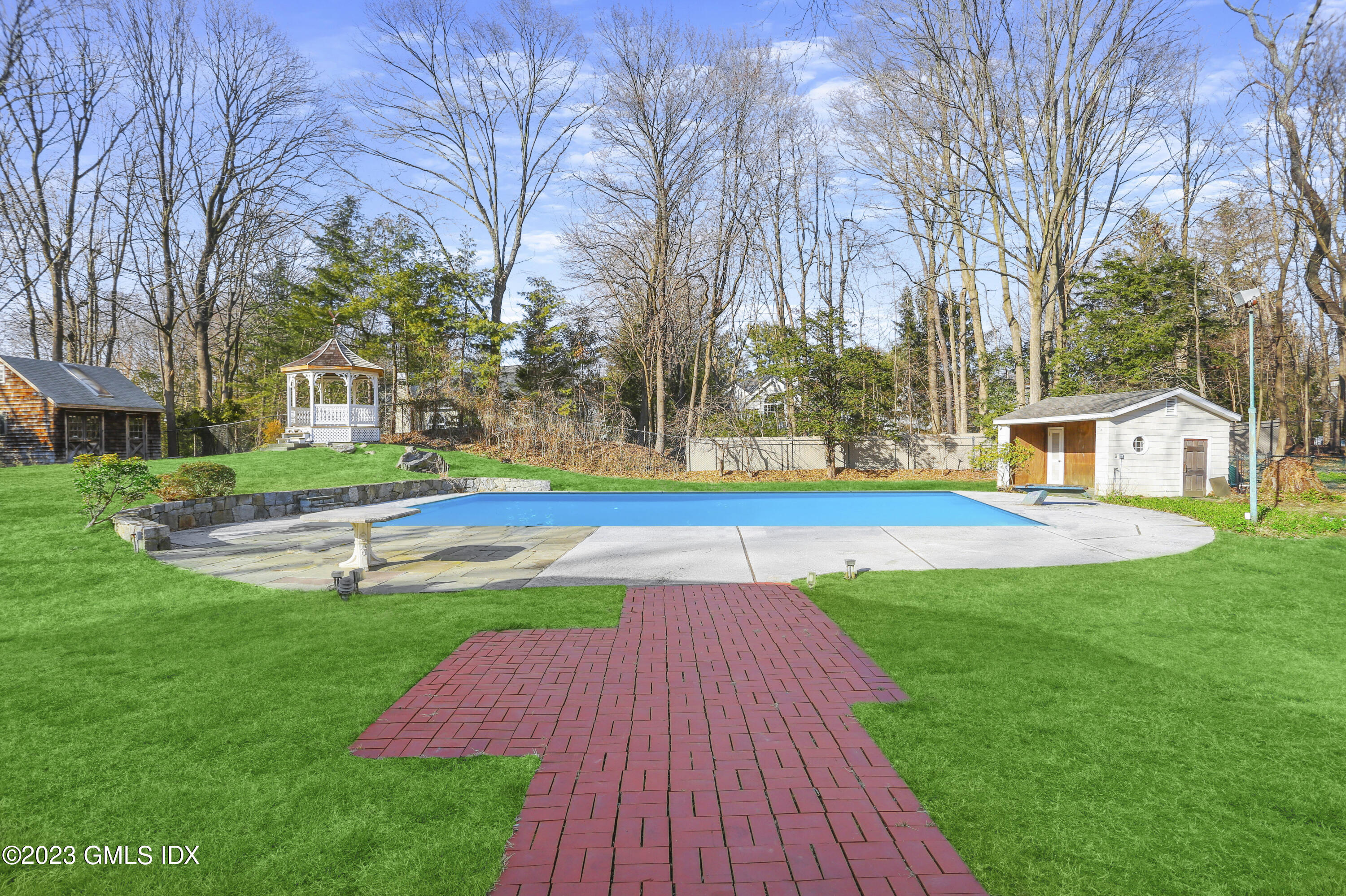 28 Intervale Road Stamford, CT 06905 - Photo 17 of 20 a view of yard with swimming pool and green space