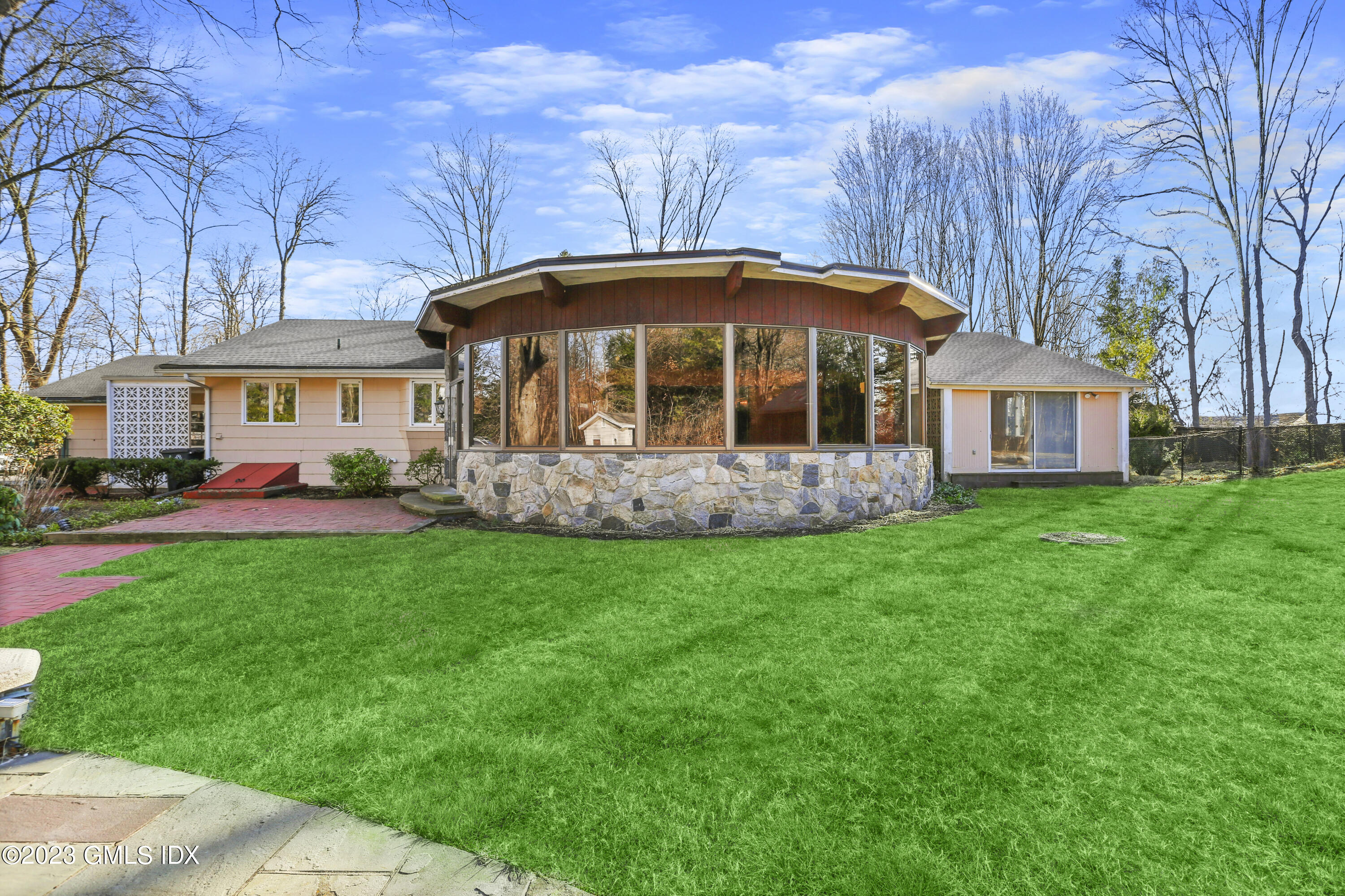 28 Intervale Road Stamford, CT 06905 - Photo 2 of 20 a front view of a house with a garden