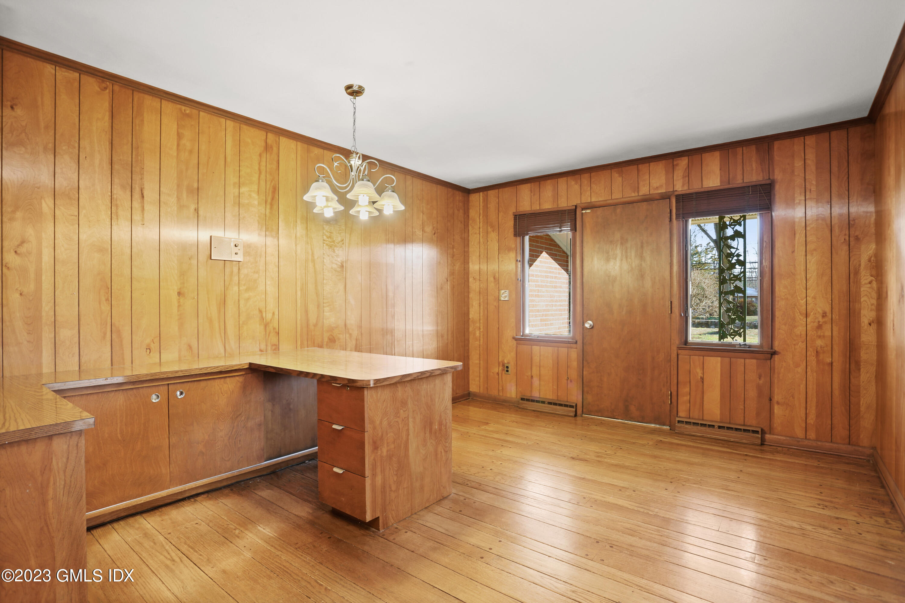 28 Intervale Road Stamford, CT 06905 - Photo 5 of 20 a view of an empty room with window and hardwood floor
