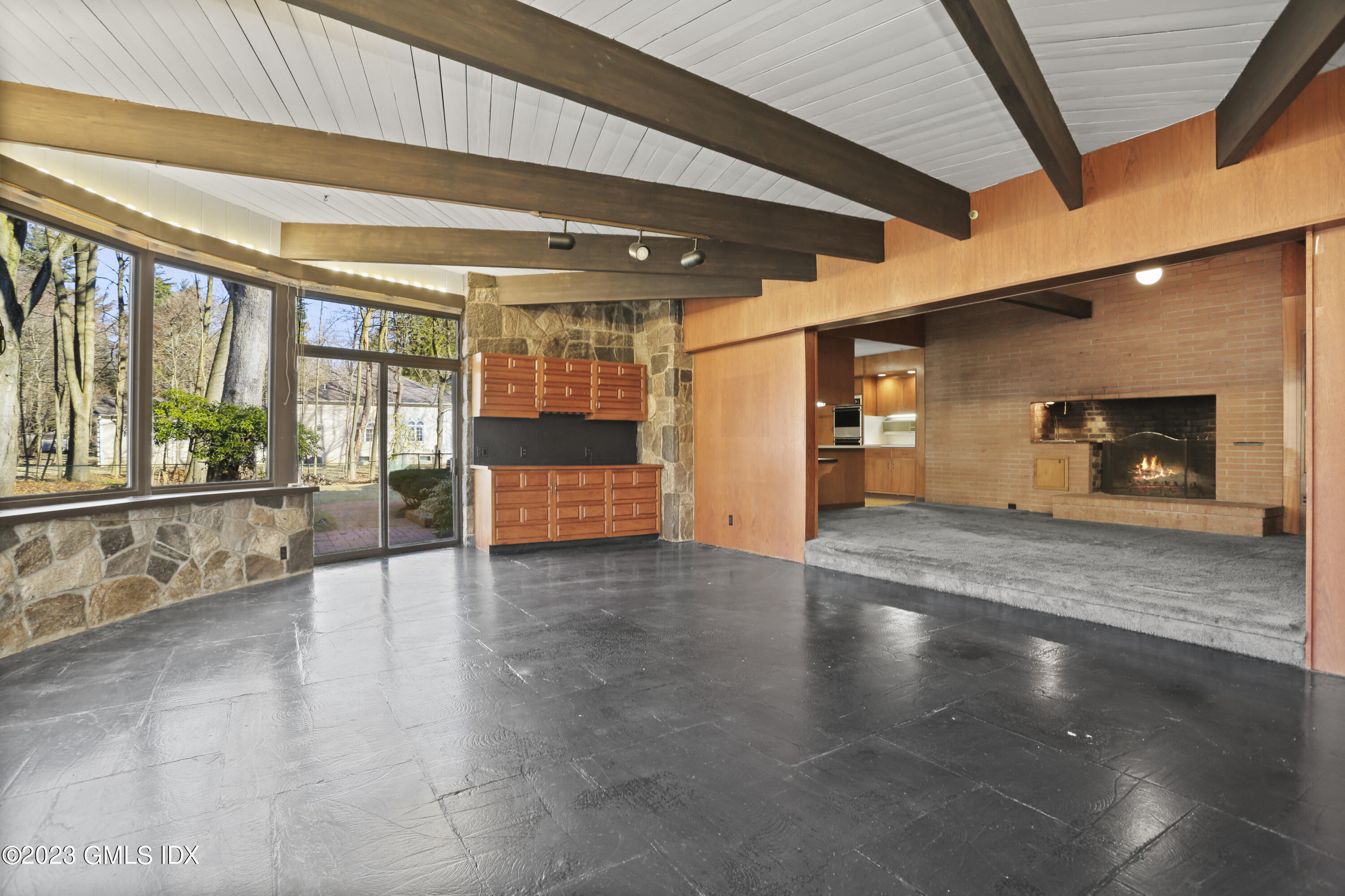 28 Intervale Road Stamford, CT 06905 - Photo 10 of 20 an empty room with wooden floor and windows