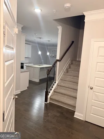 a view of entryway with wooden floor