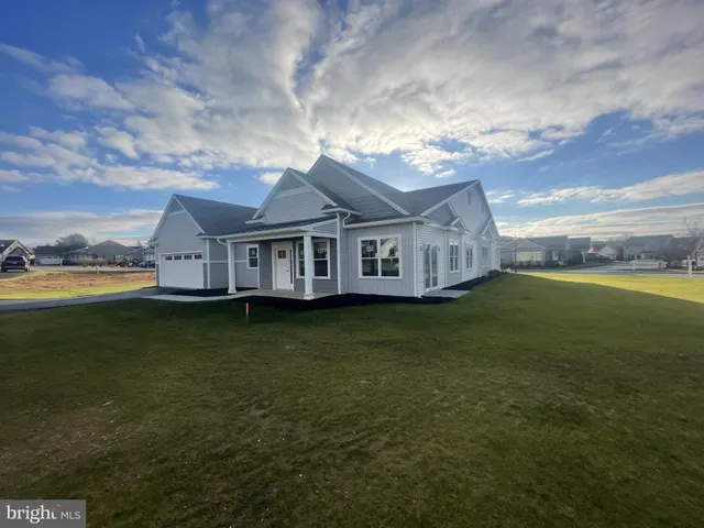a view of a house with a big yard