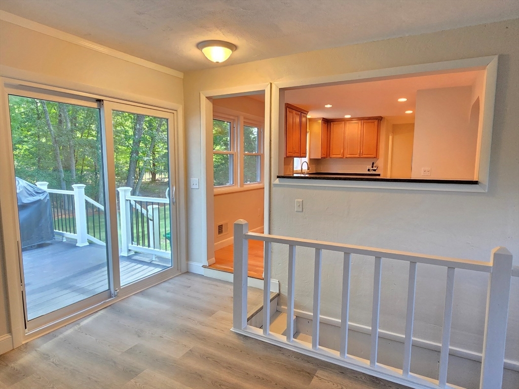 26 Wenzell Road Ashland, MA 01721 - Photo 19 of 33 a view of staircase with a floor to ceiling window and front door
