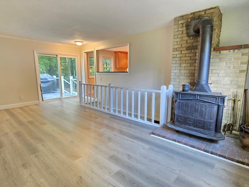 26 Wenzell Road Ashland, MA 01721 - Photo 22 of 33 a view of livingroom with furniture and staircase