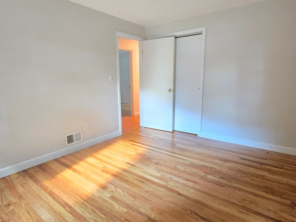 26 Wenzell Road Ashland, MA 01721 - Photo 24 of 33 a view of empty room with wooden floor
