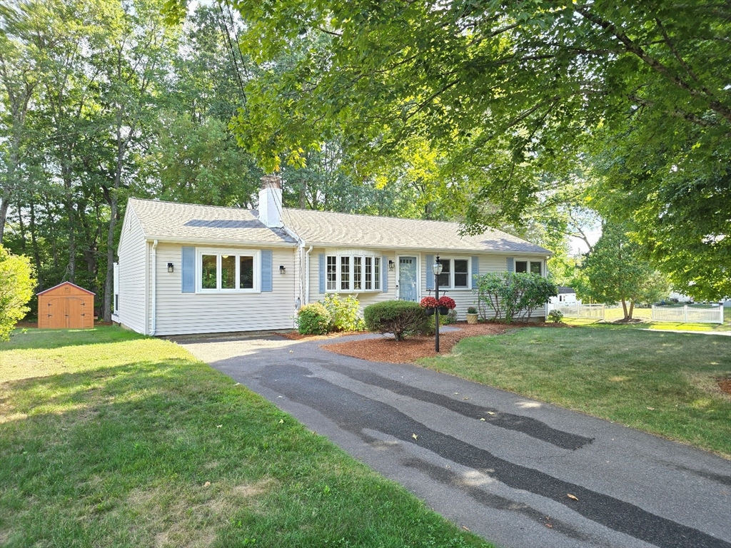 26 Wenzell Road Ashland, MA 01721 - Photo 3 of 33 a front view of a house with a yard and porch