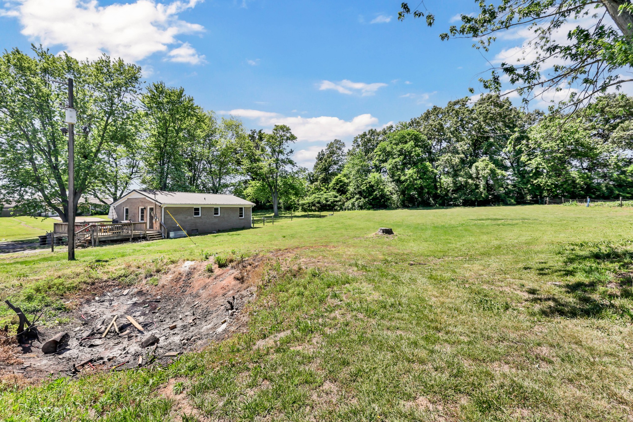 1068 Hugh Hunter Road Oak Grove, KY 42262 - Photo 30 of 30 a view of a field with a tree