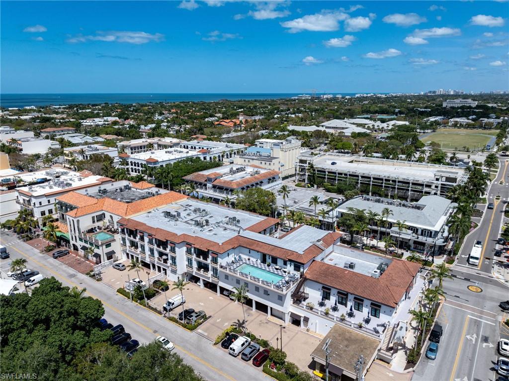 72 7th Street South, Unit 206 Naples, FL 34102 - Photo 29 of 38 an aerial view of a city