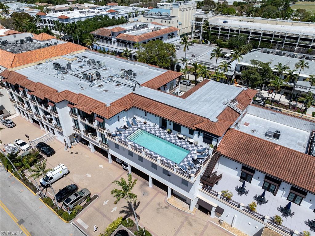 72 7th Street South, Unit 206 Naples, FL 34102 - Photo 37 of 38 an aerial view of a city