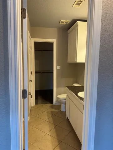 a bathroom with a sink and a shower